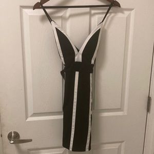Black and white mini dress. Perfect for a night out. Brand new with tag.